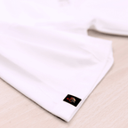 White shirt with a logo