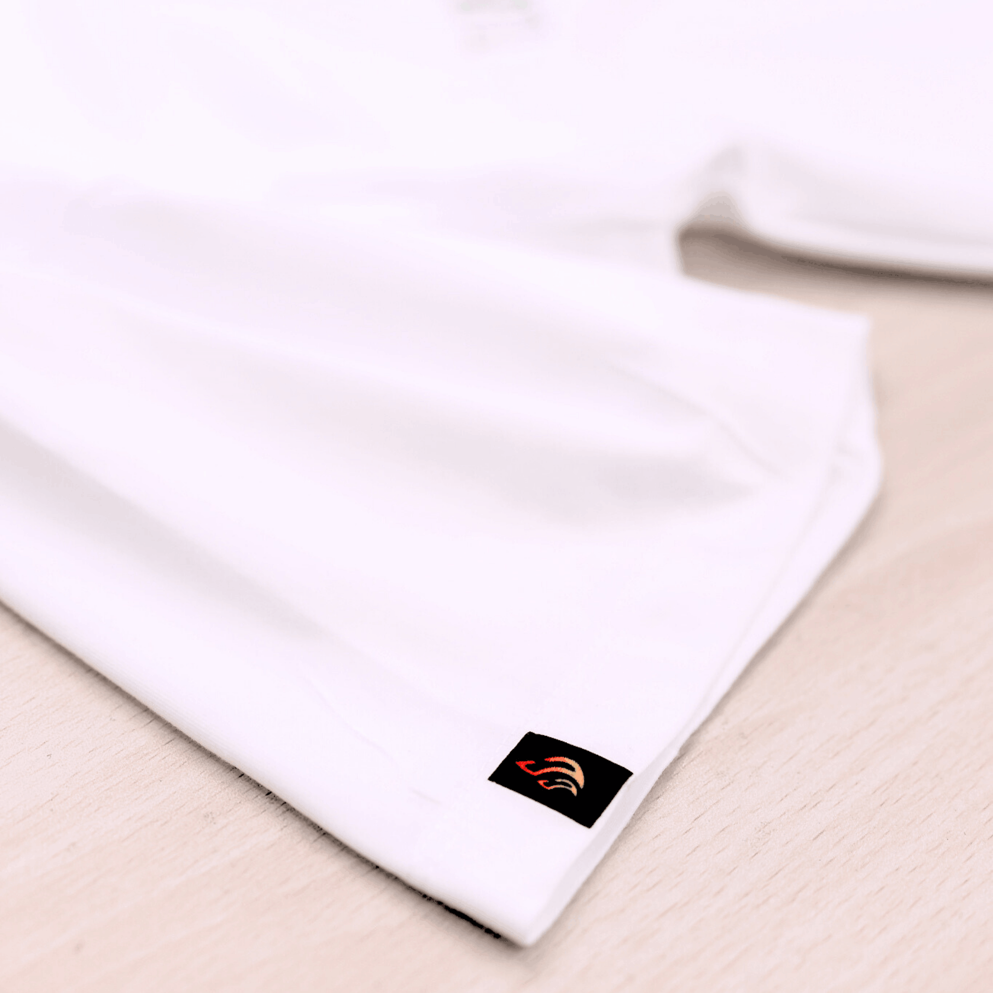 White shirt with a logo