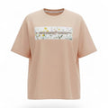 Peach t-shirt with a graphic design on a white background