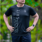 Gentleman wearing a mint and black running shirt, outdoors