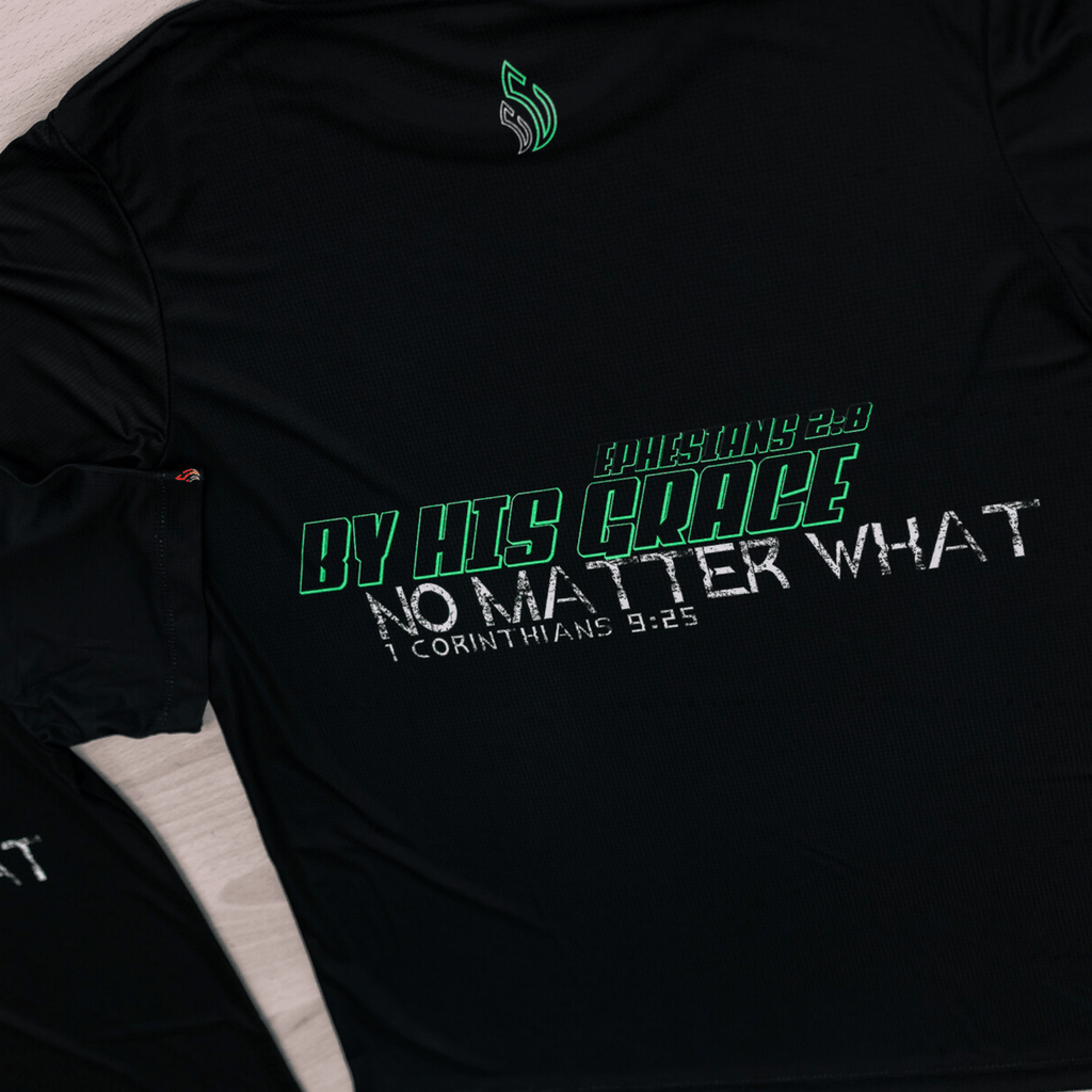 Mint and black Running shirt with  text that says 'Ephesians 2:8. By His grace No Matter What. 1 Corintians 9:25