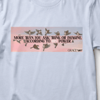 light blue t-shirt with motivational graphic and text on a light gray background
